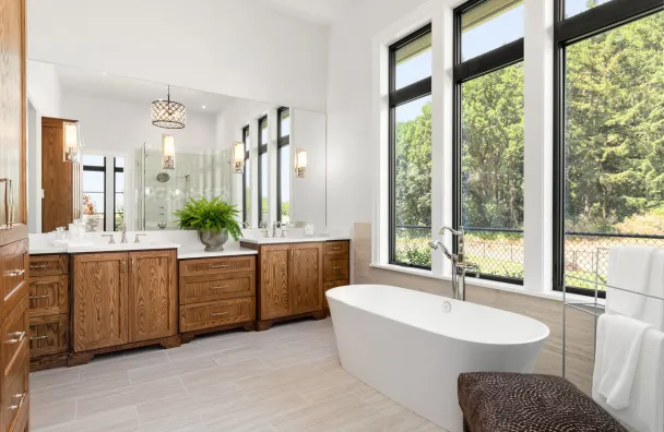 Completed bathroom remodel with freestanding tub and natural light in Los Angeles