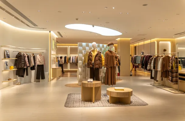 Commercial remodeling in Los Angeles with modern retail store renovation, display lighting, clothing racks, showroom layout, and finished business interior