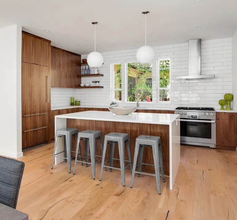 Modern wood kitchen cabinets and island installed during Los Angeles kitchen remodel